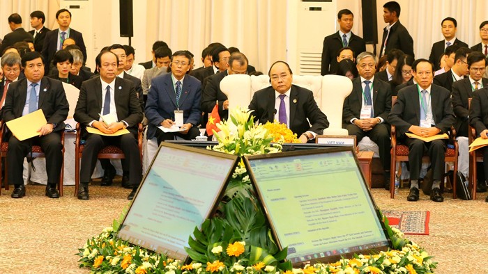 Thủ tướng Nguyễn Xuân Phúc tại Hội nghị Cấp cao Khu vực Tam giác phát triển Campuchia - Lào - Việt Nam lần thứ 9. Ảnh: Thống Nhất - TTXVN