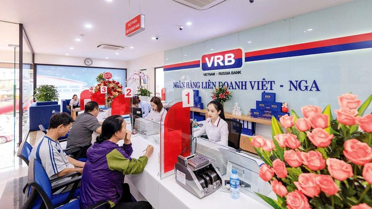 Doanh nghiệp xuất nhập khẩu Việt Nam trước mắt có thể thanh toán với thị trường Nga qua Ngân hàng Liên doanh Việt - Nga. Ảnh: Song Lê