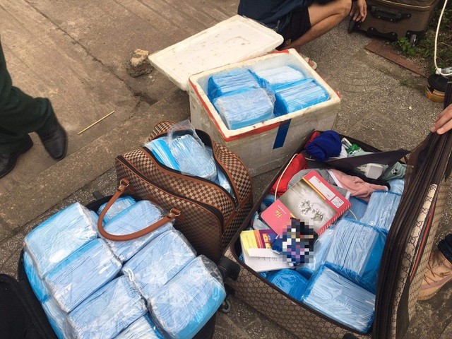 Quảng Bình: Vận chuyển lậu hàng chục ngàn chiếc khẩu trang y tế qua Lào tiêu thụ ảnh 1