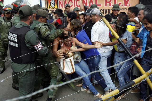 Venezuela "vùng vẫy" trong khủng hoảng đổi tiền ảnh 3