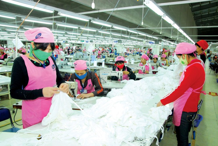 Kim ngạch xuất khẩu hàng hóa của Việt Nam tăng trưởng cao nhưng giá trị gia tăng mang lại chưa cao. Ảnh: Tiến Tân